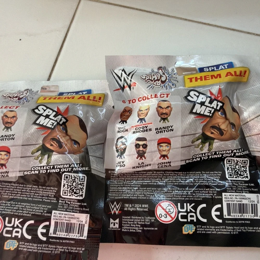 NEW 2 Sealed Packs WWE Splats Heads In The Pack Series Wrestling Stars Splat Me